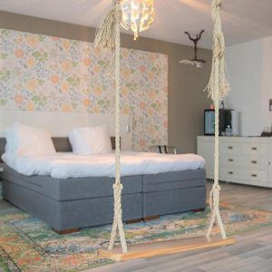 Kamer "Boetiek" met een King Size Bed
